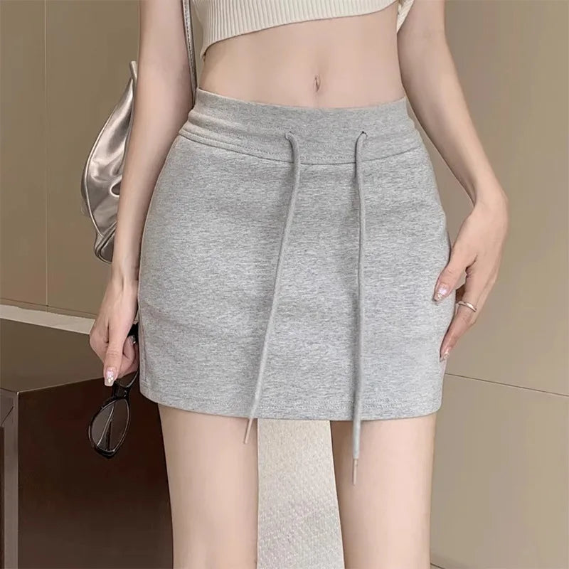 Falda corta deportiva gris antideslumbrante para mujer, falda corta de cintura alta para abrazar la cadera, pantalones y falda cómodos