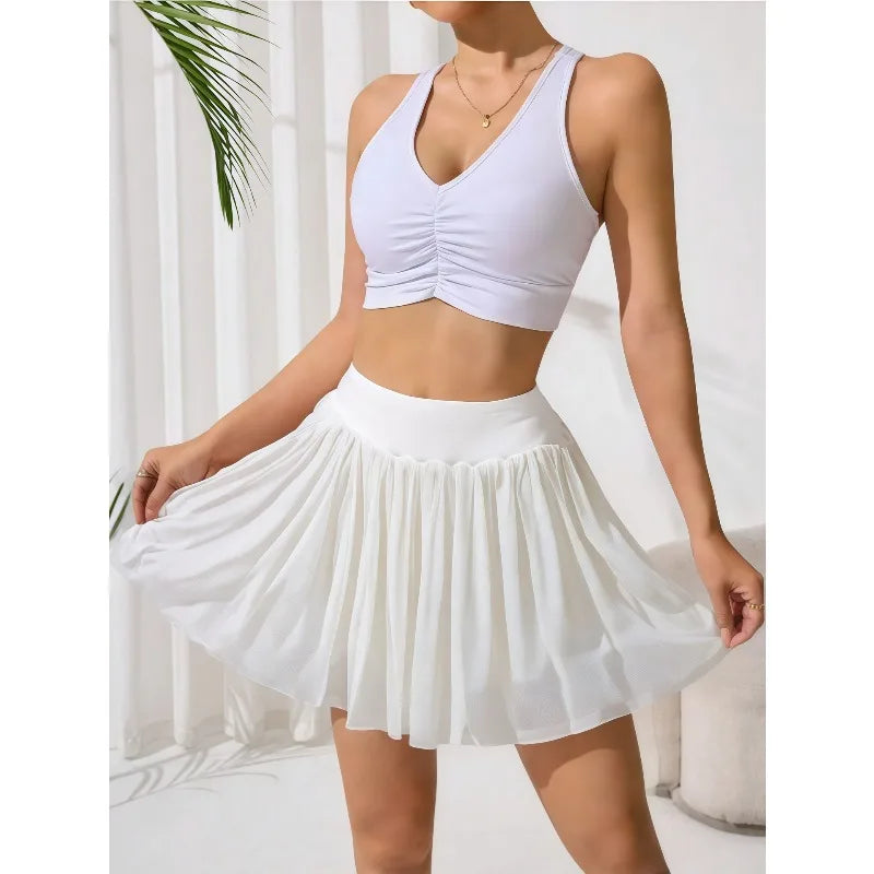 Nuevo vestido de estilo europeo para mujer, falda de Yoga, pantalones cortos integrados, malla de cintura alta para entrenamiento de tenis, gimnasio, Fitness, vestido de tenis