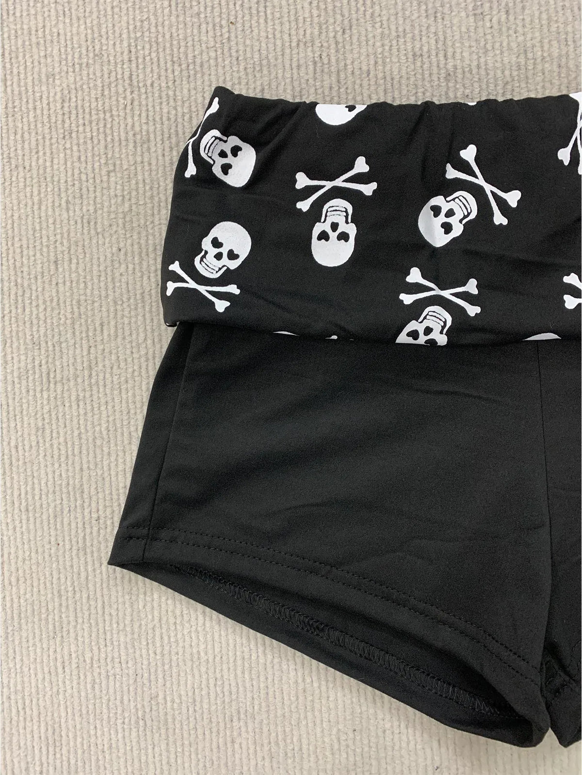 Shorts con estampado de calavera de estilo grunge para mujer, shorts negros de cintura baja, ajustados y sexys